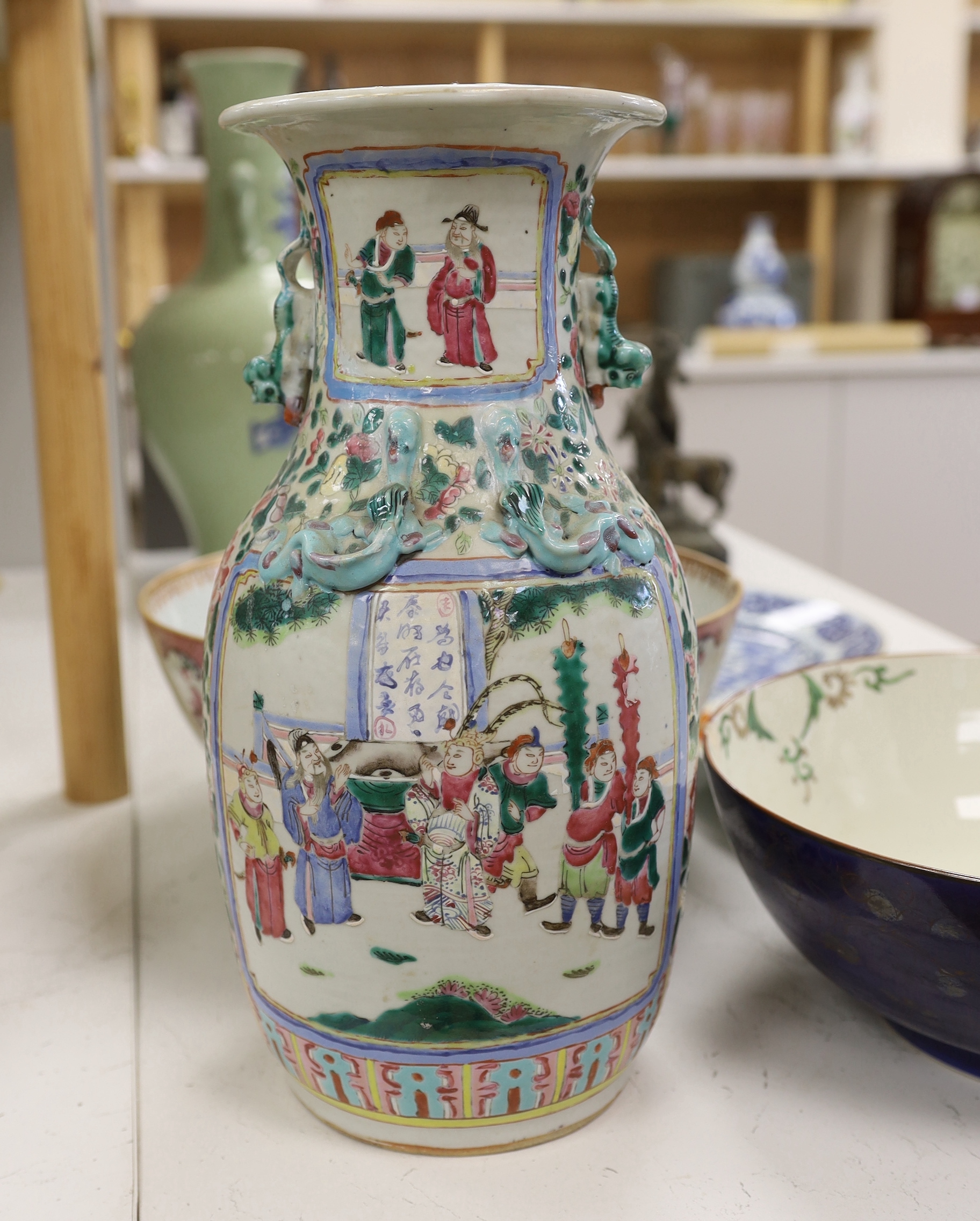 A group of 18th/19th century Chinese and Japanese ceramics to include - a famille rose vase, two large bowls, a blue and white plate and four other pieces, the largest 35cm high